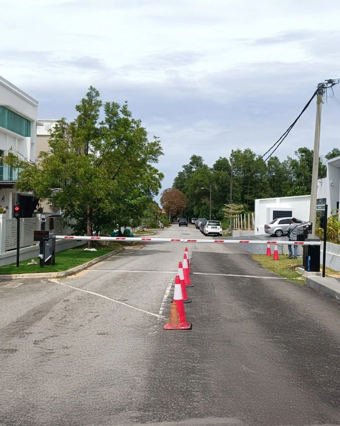 Licence plate recognition system with barrier gate at a gated residential entrance for automatic vehicle identification by Gprop Systems.